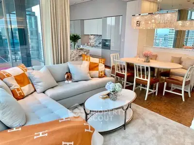 Luxurious modern living room with open kitchen and elegant dining area, featuring panoramic city views.