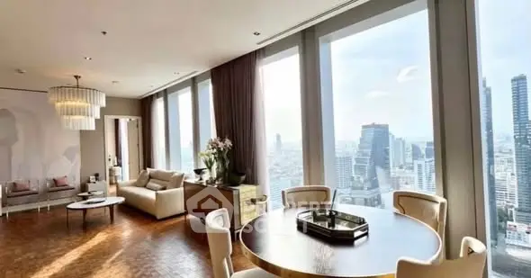 Luxurious high-rise living room with panoramic city views and elegant decor.