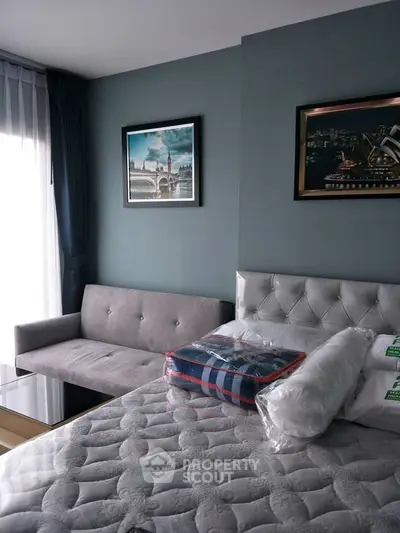 Modern bedroom with stylish decor and natural light