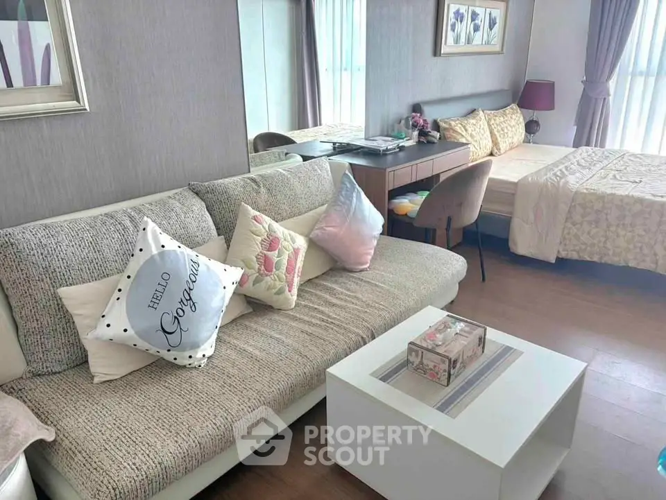 Chic studio apartment with cozy living area and stylish decor, perfect for modern urban living.