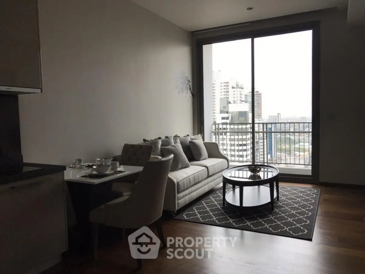 Modern living room with city view and stylish furniture in high-rise apartment