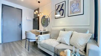 Modern living room with stylish decor and cozy seating area, perfect for relaxation and entertaining.