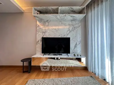Modern living room with marble TV wall and elegant decor