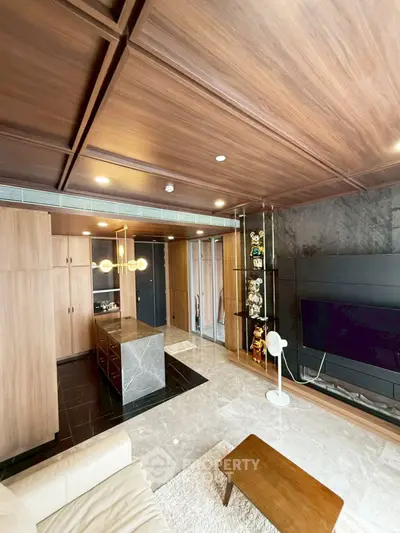 Luxurious modern living room with wooden ceiling, marble accents, and stylish decor
