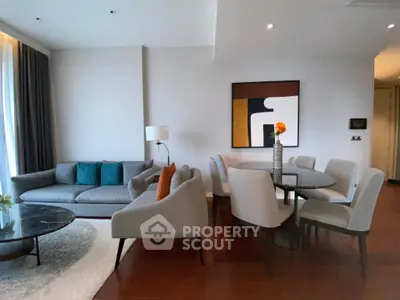 Stylish living room with modern furniture and elegant dining area, perfect for entertaining.