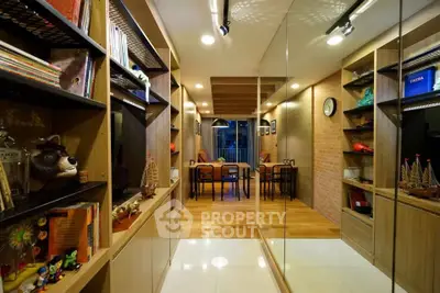 Stylish modern living room with wooden shelves and mirrored wall, perfect for urban living.