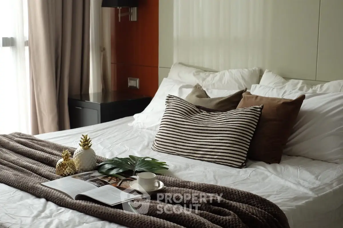 Luxurious bedroom with elegant decor and cozy bedding