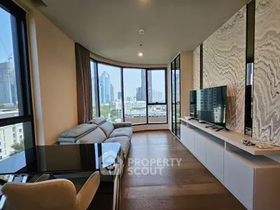 Modern living room with panoramic city view and stylish decor