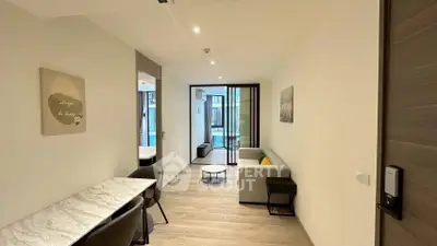 Modern living room with sleek furniture and open layout, perfect for contemporary living.