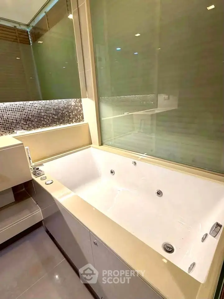 Luxurious bathroom with a modern bathtub and elegant design features.