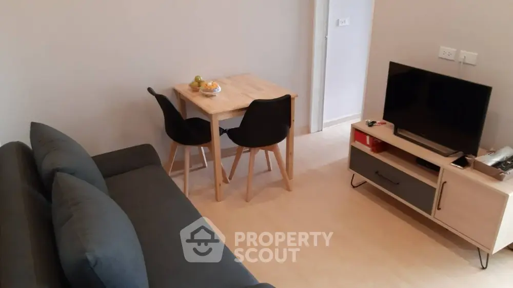 Cozy living room with modern furniture and entertainment setup