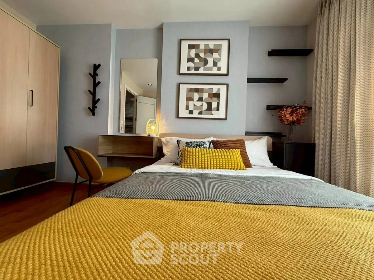 Cozy modern bedroom with stylish decor and warm lighting