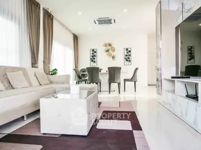 Luxurious modern living room with elegant decor and spacious dining area