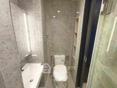 Modern bathroom with sleek design and marble tiles