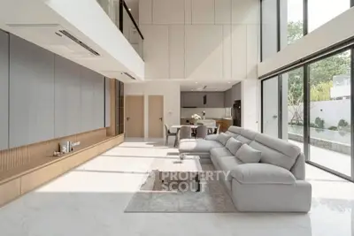 Luxurious modern living room with high ceilings and large windows