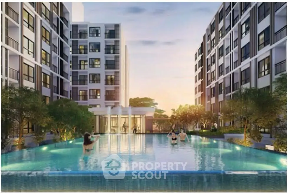 Luxurious residential complex with stunning pool and modern architecture at sunset.