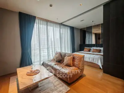 Luxurious modern bedroom with floor-to-ceiling windows and stylish leather sofa