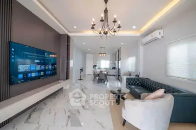 Luxurious modern living room with elegant chandelier and marble flooring