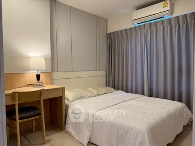 Cozy bedroom with modern decor and natural light