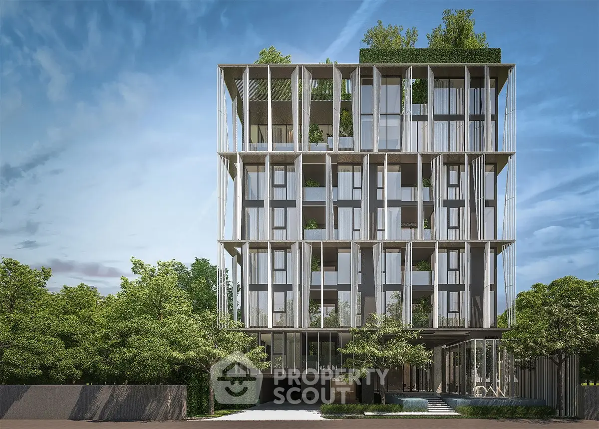 Modern architectural building with lush greenery and sleek design