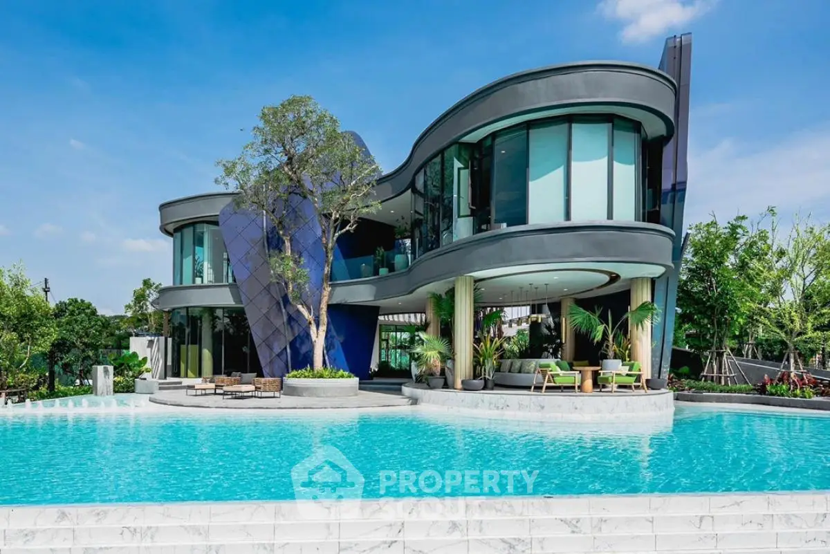 Stunning modern luxury home with unique architecture and expansive pool