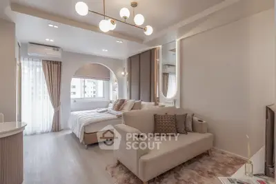 Modern studio apartment with elegant decor and natural light