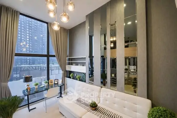 Modern living room with floor-to-ceiling windows and stylish decor in a high-rise apartment.