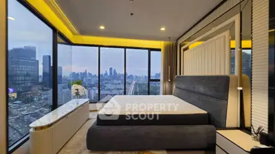 Luxurious bedroom with panoramic city view and modern decor