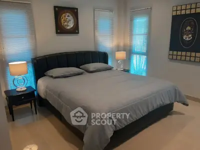 Cozy bedroom with modern decor and ambient lighting