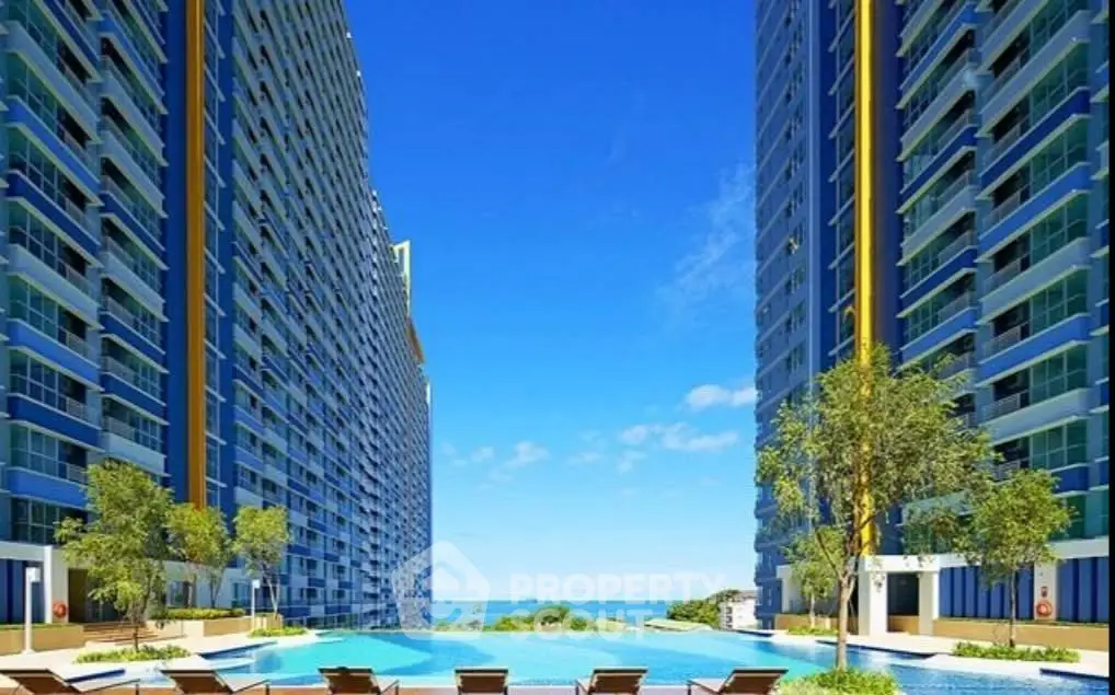 Luxurious high-rise residential buildings with stunning pool and ocean view.