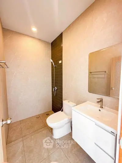 Modern bathroom with sleek fixtures and elegant tile design