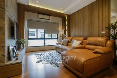 Luxurious living room with leather sofa and modern decor