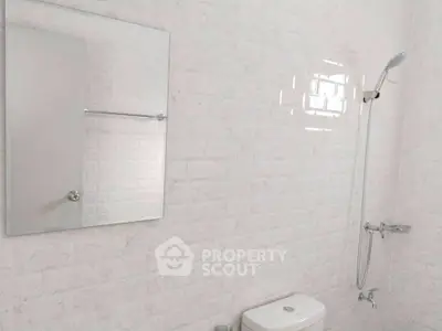 Modern bathroom with sleek shower and minimalist design