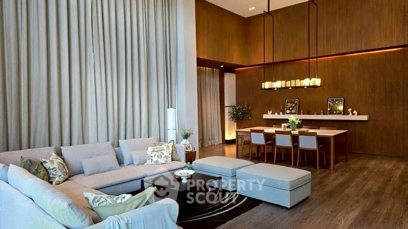 Luxurious modern living room with elegant dining area and stylish decor