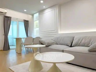 Modern living room with elegant decor and cozy seating area