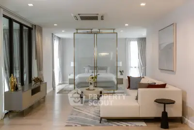 Luxurious open-plan living room with elegant decor and spacious layout