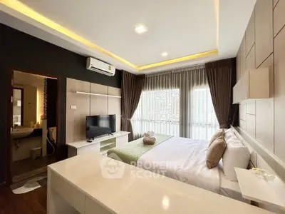 Modern bedroom with stylish decor and natural light
