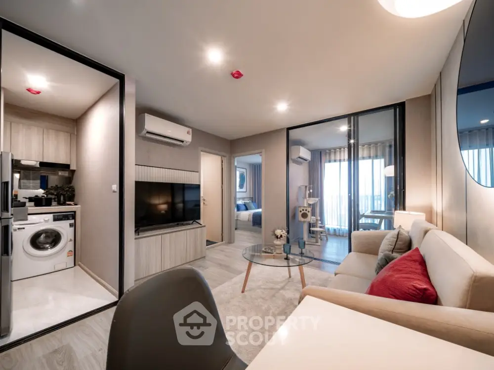Modern living room with open layout and stylish decor in a contemporary apartment