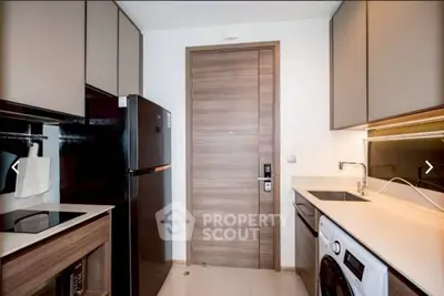 Modern kitchen with sleek cabinetry, integrated appliances, and stylish design.