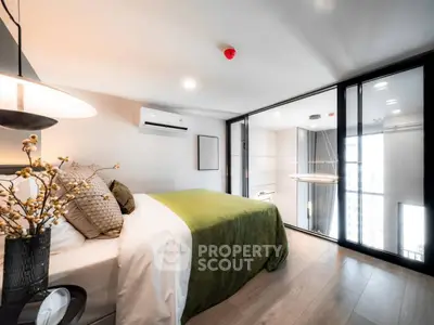 Luxurious modern bedroom with floor-to-ceiling windows and stylish decor