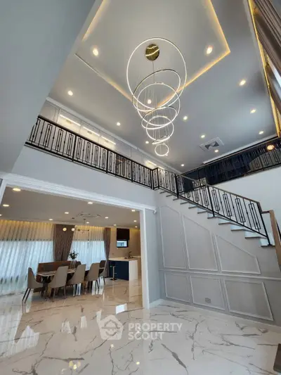 Luxurious modern living room with high ceilings and elegant lighting