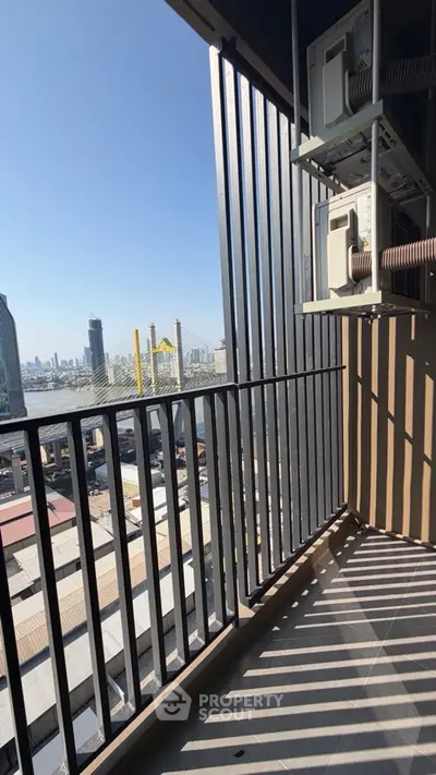 Modern balcony with city view and sleek railing design, perfect for urban living.