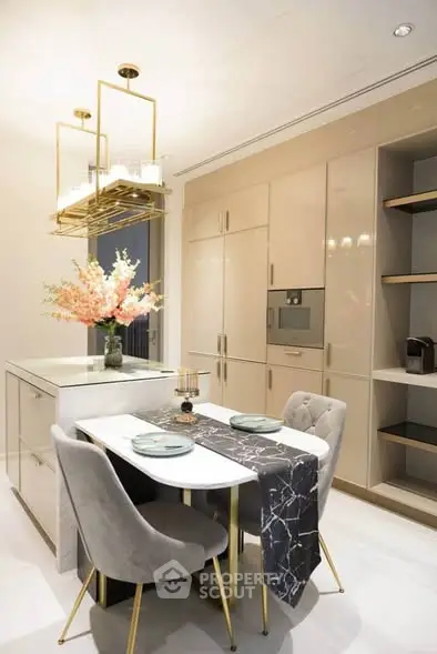 Luxurious modern kitchen with elegant dining setup and stylish lighting