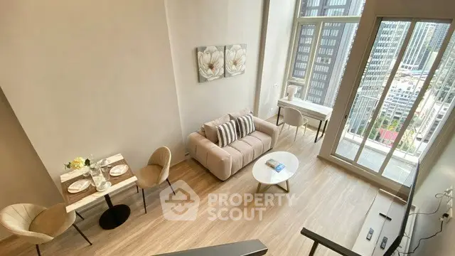 Modern high-rise apartment with stylish living room and city view