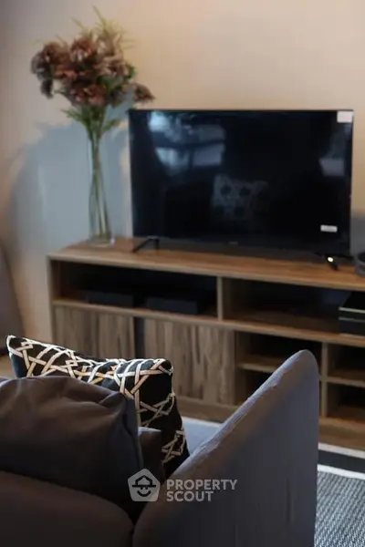 Modern living room with sleek TV stand and stylish decor