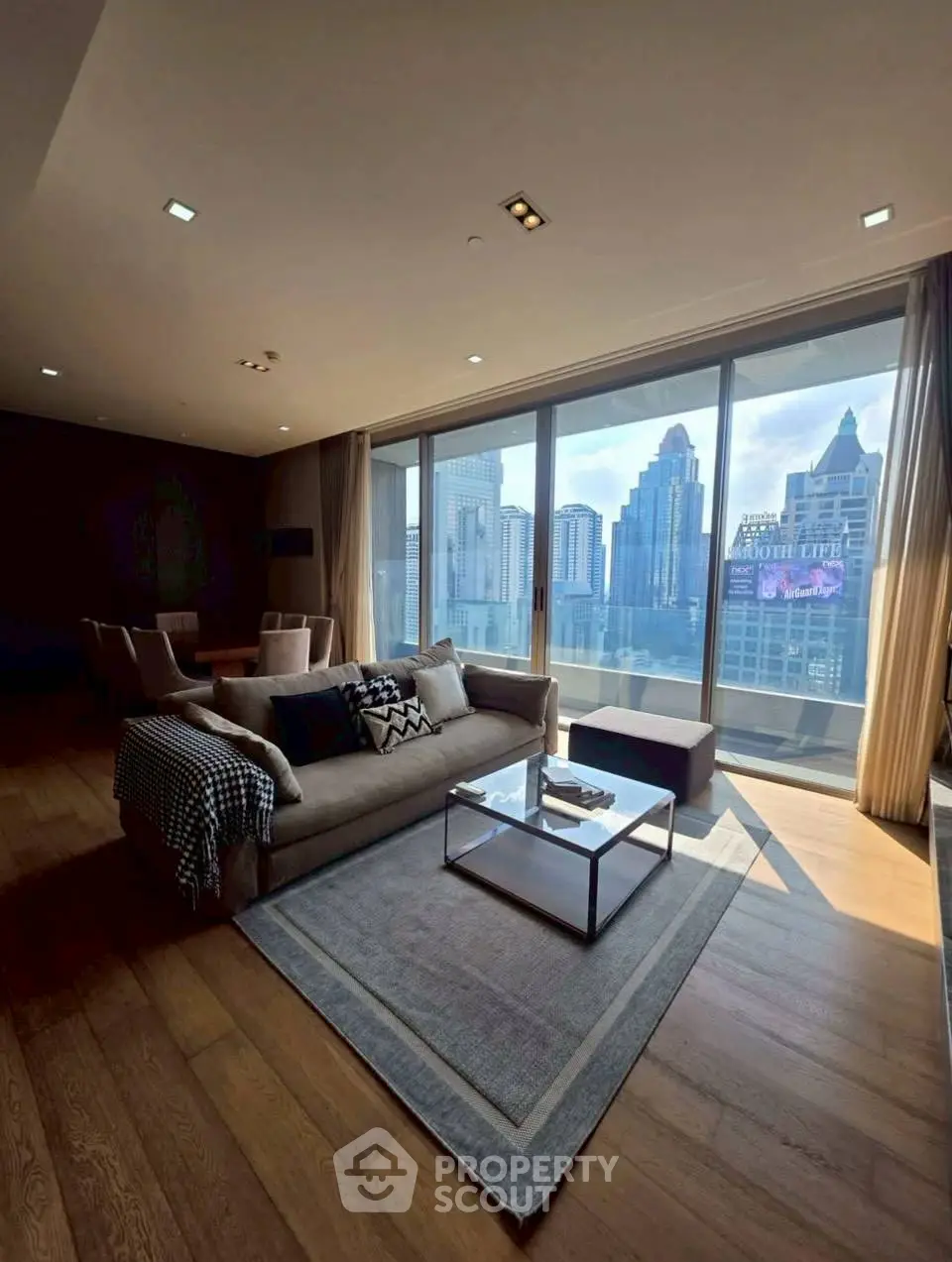 Luxurious living room with stunning city view and elegant decor