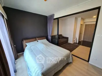Modern bedroom with cozy bed and stylish decor in a contemporary apartment