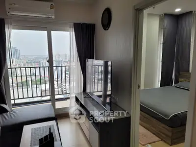 Modern apartment with balcony view, stylish living room, and cozy bedroom.
