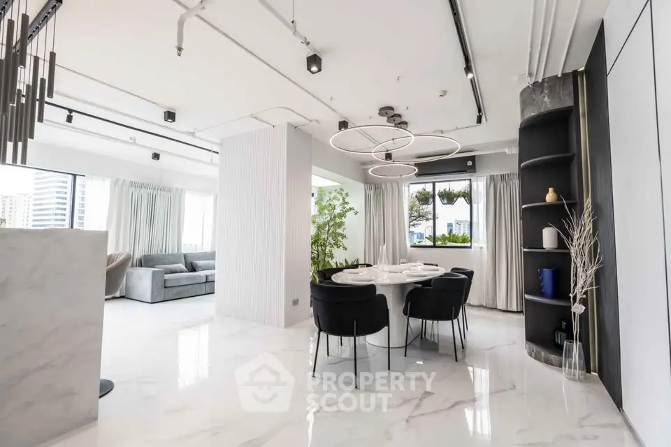 Luxurious modern living room with elegant dining area and stylish decor