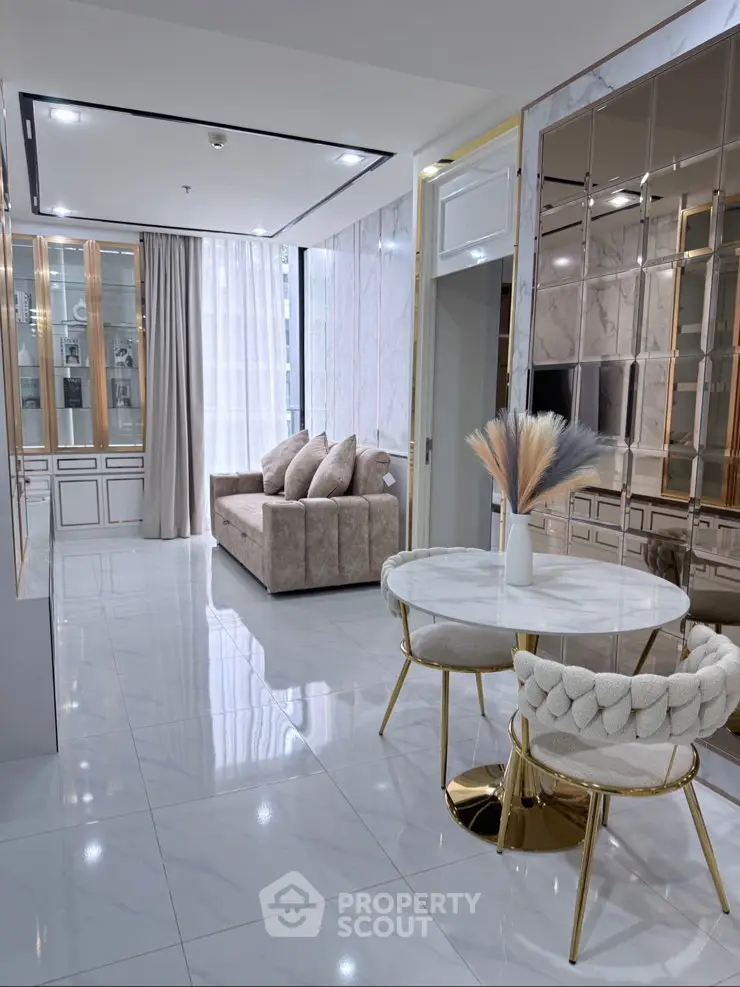 Luxurious modern living room with elegant decor and plush seating in a high-end apartment.